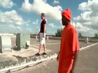 Afro gay blowing white johnson on knees